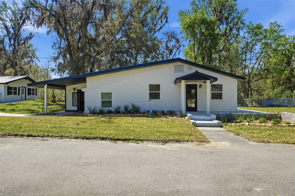 Photo of 15458 Snow Memorial Highway, Brooksville, FL 34601 (MLS # W7889543)