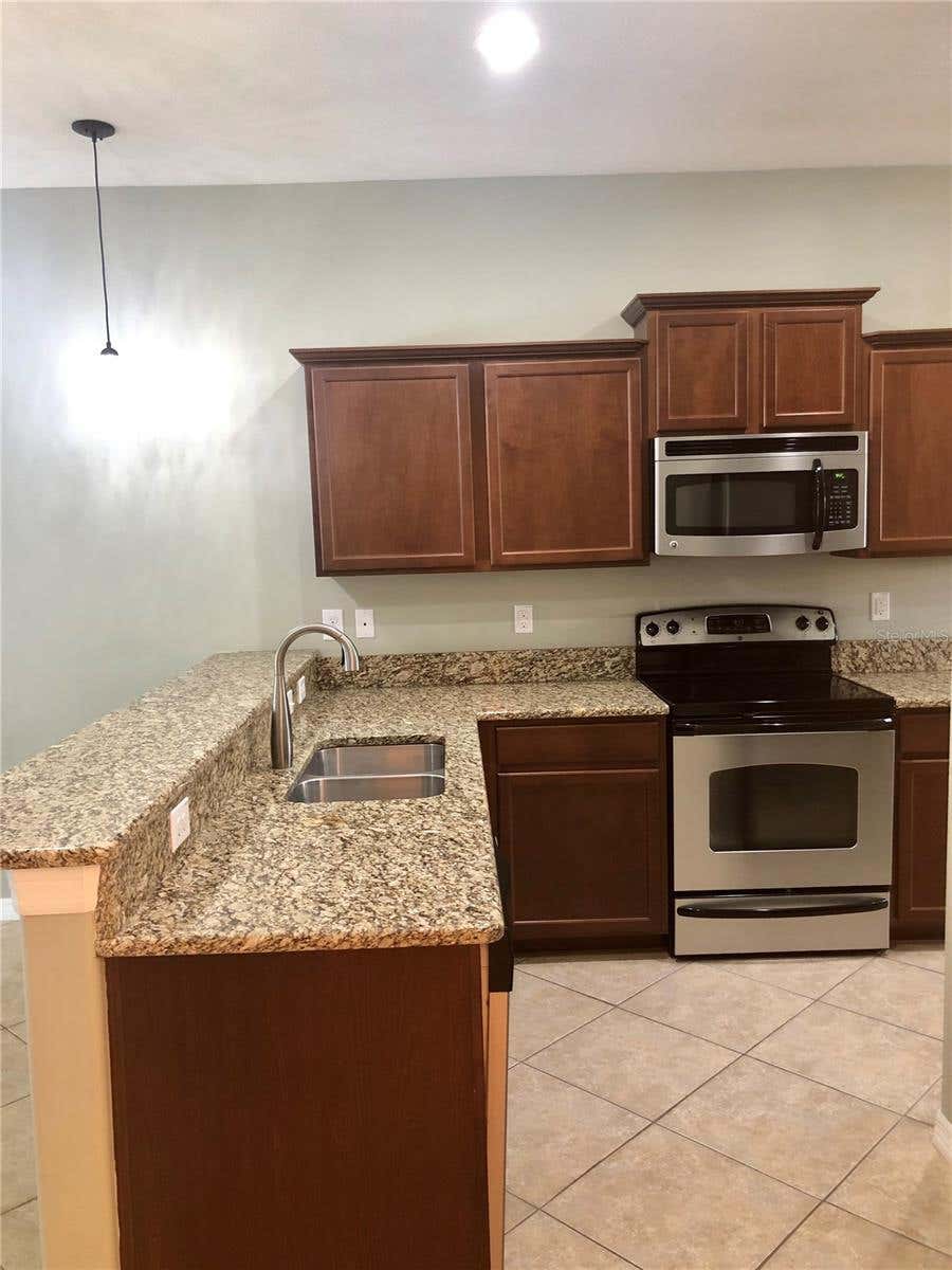 Photo of 8541 Brushleaf Way, Tampa, FL 33647 (MLS # TB8526258)