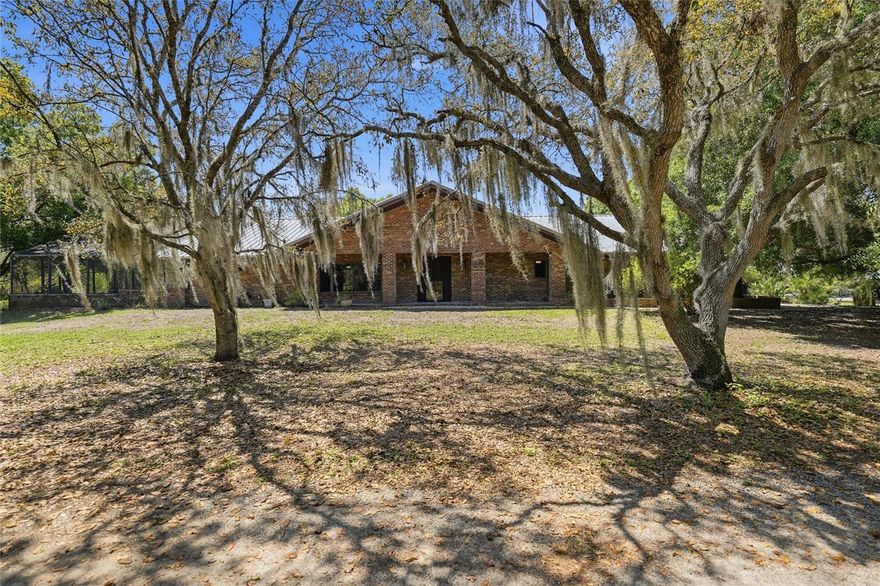 LIVE THE ULTIMATE EQUESTRIAN LIFESTYLE ON A PRIVATE 5.6-ACRE ESTATE IN PRAIRIE CREEK WEST. Tucked away in one of Punta Gorda’s most sought-after acreage communities, this exceptional property offers the perfect balance of SPACE, FUNCTIONALITY, AND SERENE COUNTRY LIVING—just a short drive from everything you need.

Set on 5.6 FULLY FENCED ACRES, this property is designed for those who crave room to roam, whether for horses, hobbies, or simply enjoying wide-open Florida land. The main residence features 3 BEDROOMS, 2 BATHROOMS, and a thoughtfully designed layout with an open, inviting feel—ideal for both everyday living and entertaining. Natural light fills the home, while the seamless indoor-outdoor flow leads you to your own private retreat.

Step outside to enjoy a SPARKLING POOL AND EXPANSIVE COVERED LANAI, creating the perfect space for relaxing afternoons, hosting gatherings, or soaking in the peaceful surroundings.

For equestrian enthusiasts, this property truly stands out. A 2-STALL HORSE BARN WITH TACK ROOM provides a functional and comfortable setup for your horses, while the acreage allows for grazing, riding, and endless outdoor enjoyment. The surrounding area is known for its scenic trails and natural beauty, making it an ideal location for horseback riding and outdoor exploration.

In addition to the main home, the property includes a PRIVATE 1 BEDROOM, 1 BATH GUEST HOUSE, perfect for extended family, visitors, or even potential rental or caretaker use. A 13x13 WORKSHOP offers space for projects, storage, or hobbies—adding even more versatility to this already impressive estate.

Located in the highly desirable Prairie Creek West community, you’ll enjoy the peace and privacy of country living while still being within easy reach of downtown Punta Gorda, shopping, dining, golf courses, and Gulf Coast beaches.

This is a RARE OPPORTUNITY to own a truly special property where lifestyle, land, and location come together. Whether you’re bringing your horses, your toys, or simply your vision of a quieter way of life—this property is ready to deliver.