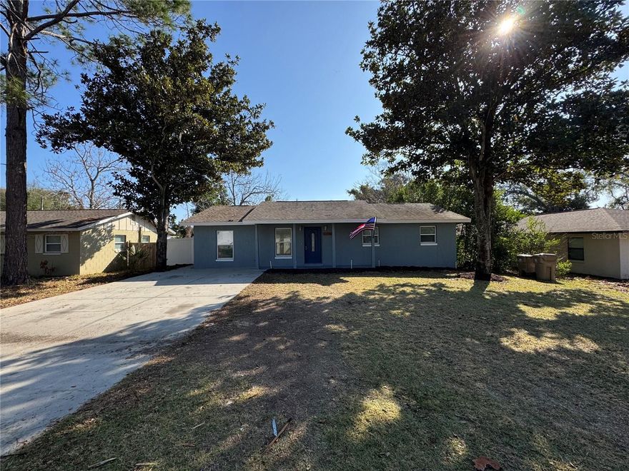 Hard to find and refreshed 4 bedroom 2 bath home in this area of Leesburg. Tastefully upgraded with solid surface counters, tastfull cabinets, kitchen island, and appliance suite. New carpet and neutral paint colors. French doors open to a deck overlooking the private backyard with an additional screen porch adjacent to the deck. Newer systems like AC and appliances. Bring your picky buyers as this is a great home for the price. Turnkey home. Walking distance to Lake Square Mall.