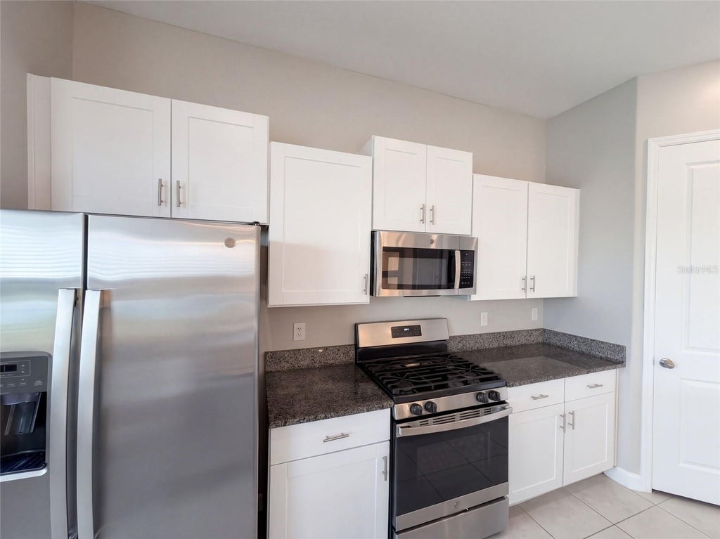 Photo of 9430 Channing Hill Drive, Ruskin, FL 33573 (MLS # O6448692)