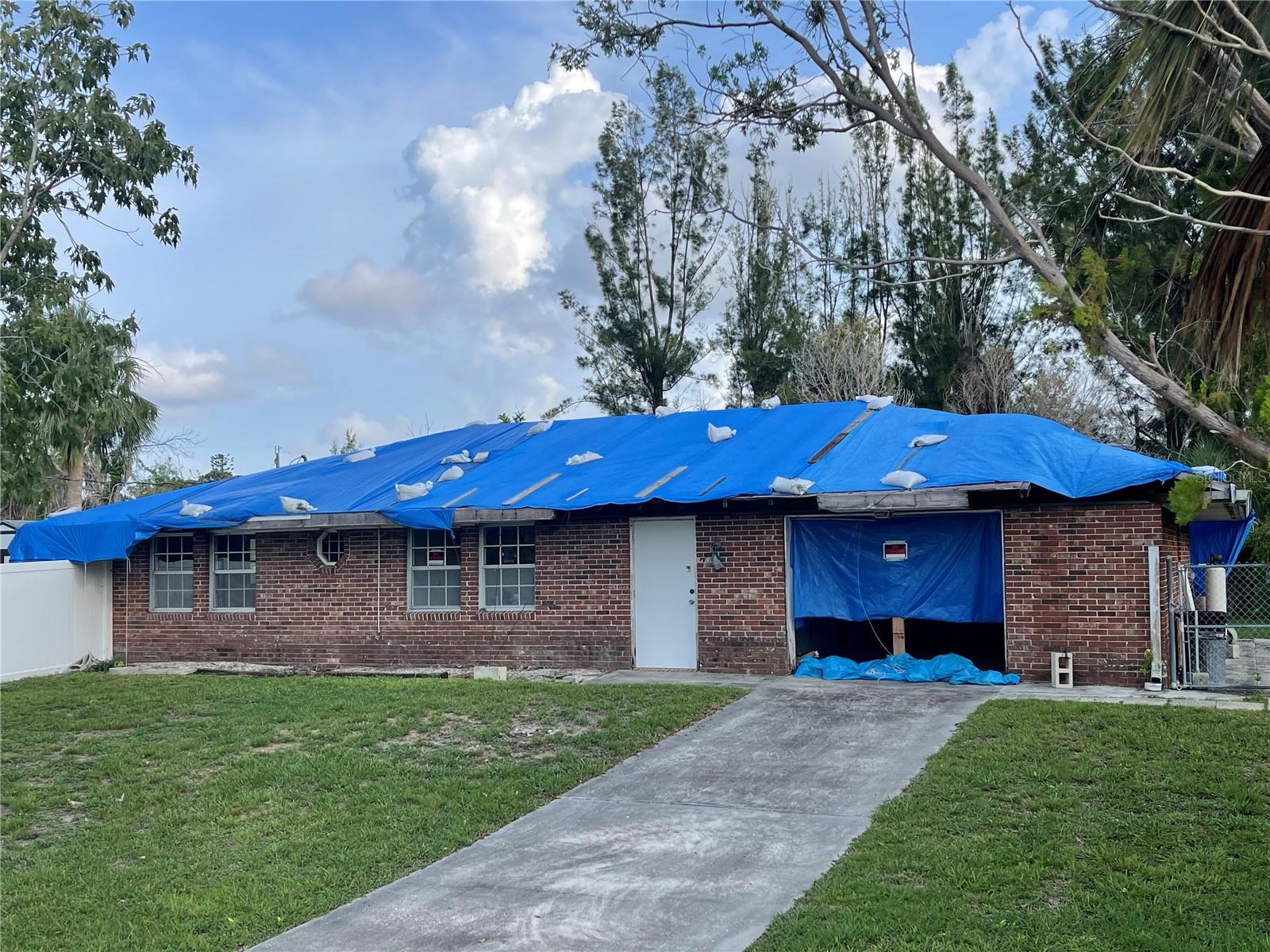 This stressed home needs YOU & your talents! Bring your tools and ambition and put this hurt house back into a HOME! The house sits on .87 acres (4 lots combined). The yard is mostly clear, with mature vegetation. The yard is fenced and private. Lots of room to add a pool! The possibilities could go on and on. You are a short walk or bike ride to world renowned Warm Mineral Springs. If mineral water is not your cup of tea, North Port has its own Water Park. There are plenty of beautiful beaches within 30 minute drive up and down our west coast. There are numerous sports possibilities located within minutes drive. There is a main hospital, shopping centers, restaurants, entertainment.