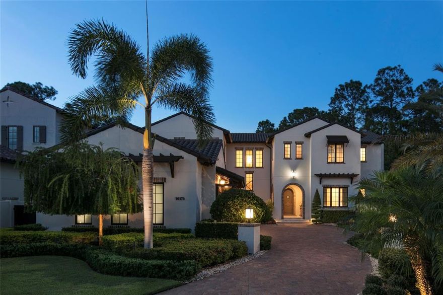 Ideally situated on an oversized lot in the Marceline neighborhood of Golden Oak, timeless Mediterranean features blend harmoniously with the natural environment. Upon entry, the eye is drawn through the spacious entry foyer to the sparkling pool and woodlands, the great room opens onto a sumptuous outdoor living area creating a resort-inspired retreat perfect for effortless entertaining. Standout features include a chef’s quality kitchen, first-floor owner’s suite with private pool access, and impressive game room. Disney touches sprinkled throughout bring an added touch of whimsy to this alluring haven. Golden Oak at Walt Disney World® Resort is a residential resort community where families can live in the embrace of luxury, privacy and the magic of Disney. This gated community features distinctive neighborhoods of magnificent homes, expansive natural preserves and inviting amenities—including access to Golden Oak’s private clubhouse, Summerhouse, with superb food offerings served in a casually elegant dining room, courtyards, pool area, fitness facilities, and family room. In addition, residents have access to Club Life, Your Special Connection to the Magic, including access to the Golden Oak Member Services team, park transportation, signature club events, theme park experiences, and much, much, more. Also at Golden Oak is Four Seasons Resort Orlando at Walt Disney World® Resort, which hosts the 18-hole Tranquilo golf course, full-service spa, meeting facilities, and superlative restaurants.