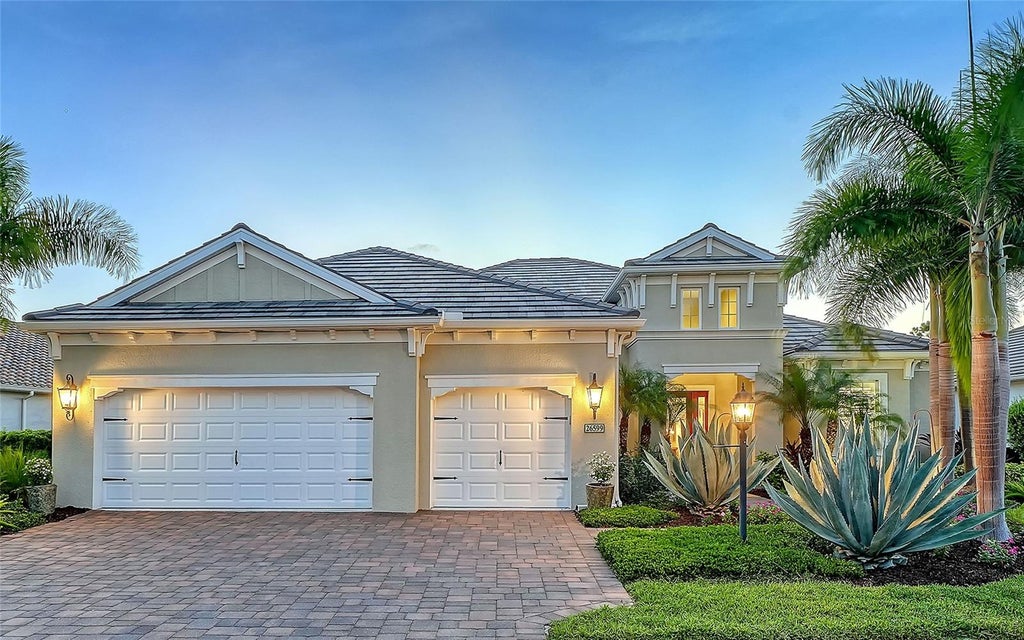 Photo of 26599 Raphis Royale Boulevard, Englewood, FL 34223 (MLS # A4704637)