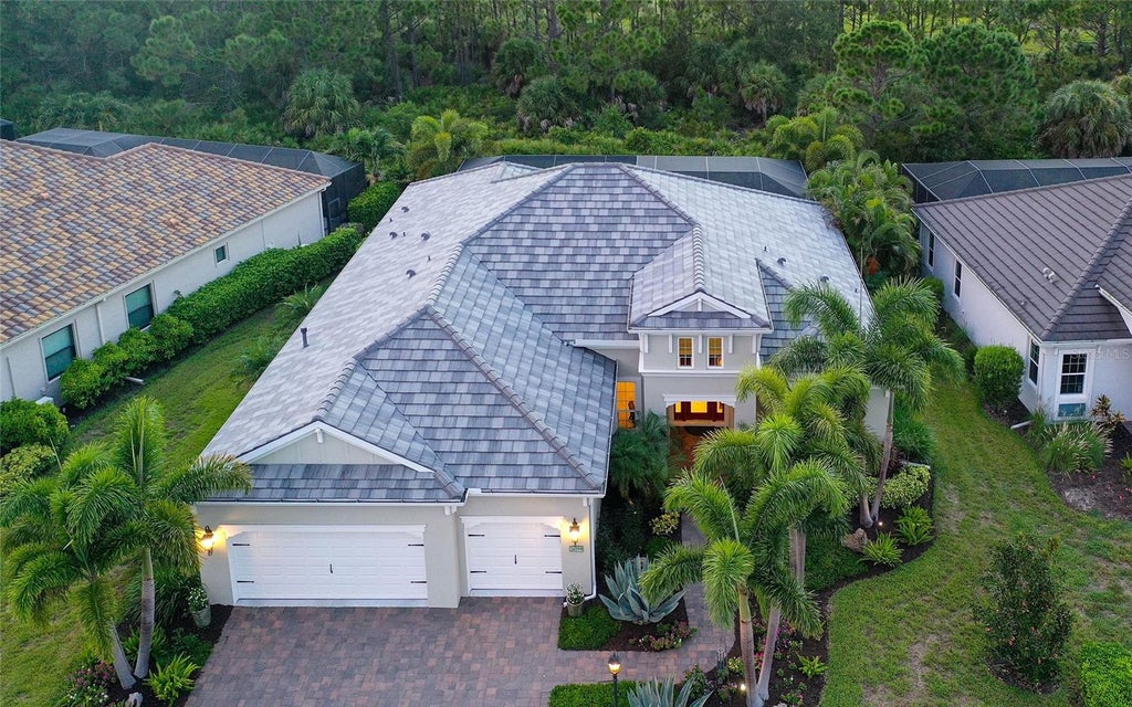 Photo of 26599 Raphis Royale Boulevard, Englewood, FL 34223 (MLS # A4704637)