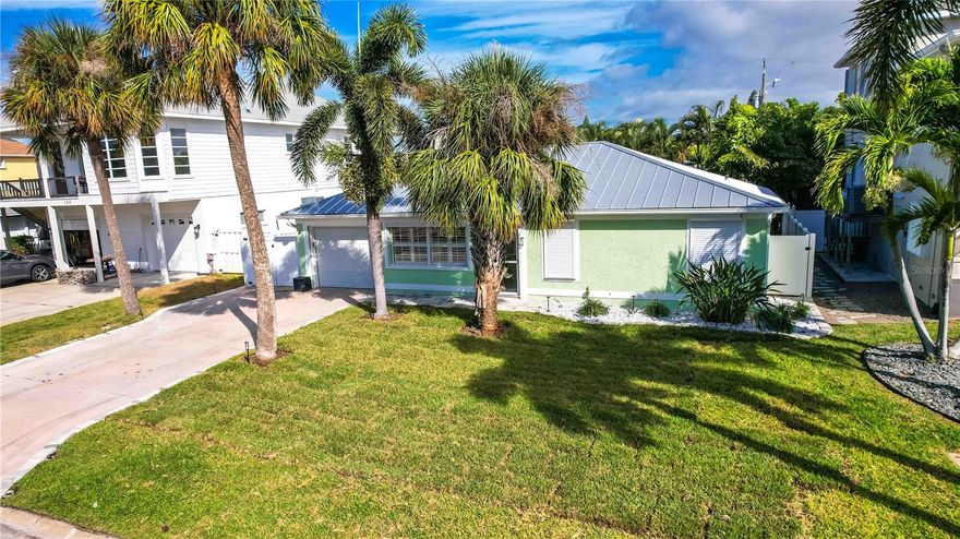 Enjoy the luxury of a practically brand-new home—without paying the new-construction premium. Ideally situated just three homes away from Gulf Blvd, this beautifully restored property puts you steps from the beach, offering the perfect blend of coastal convenience and modern comfort.

Inside, you’ll find upgraded Cafe’ appliances, premium shutters, elegant cabinetry with upgraded hardware, designer fixtures, solid doors, and high-end flooring throughout. Every detail has been thoughtfully selected to elevate the style and functionality of the home.

Whether you’re looking for a full-time residence, a second home, or an investment opportunity, this beachside retreat delivers unbeatable location, fresh modern finishes, and relaxed coastal living.