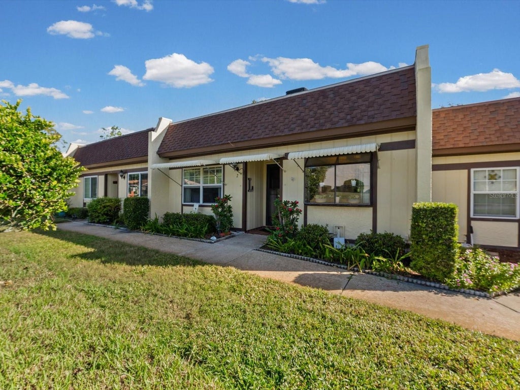 Photo of 11430 Carriage Hill Drive #2, Port Richey, FL 34668 (MLS # TB8561368)