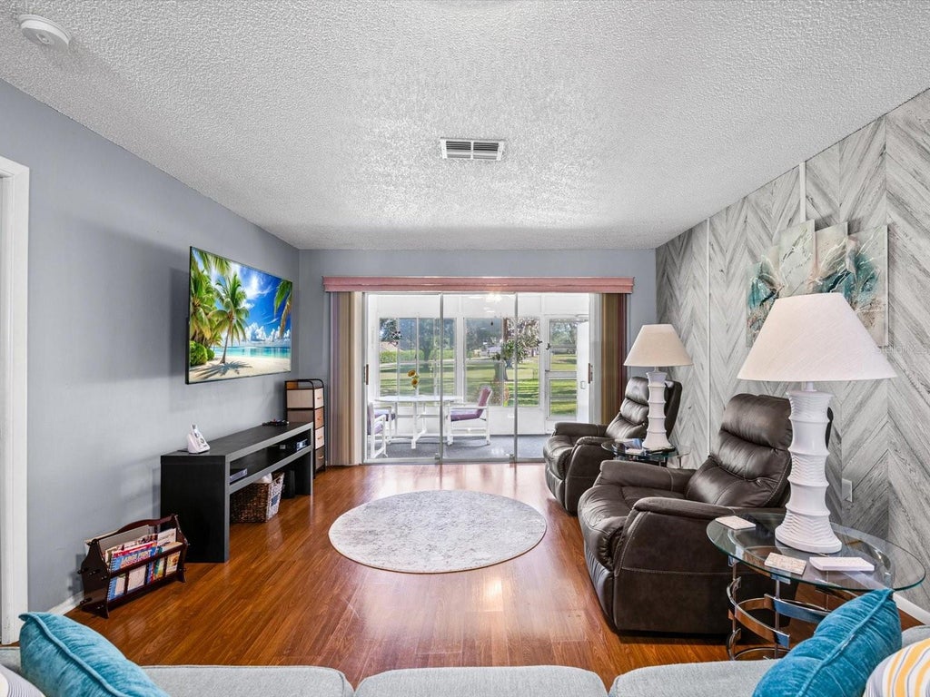 Photo of 11430 Carriage Hill Drive #2, Port Richey, FL 34668 (MLS # TB8561368)
