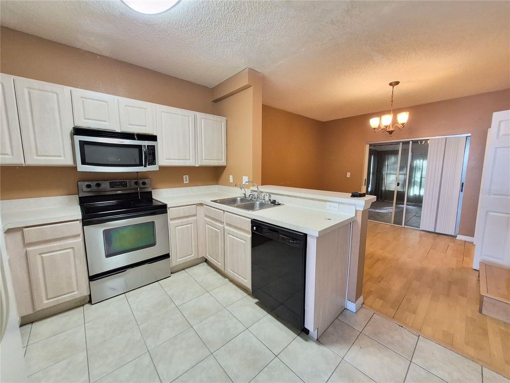 Photo of 6549 Osprey Lake Circle, Riverview, FL 33578 (MLS # O6348218)