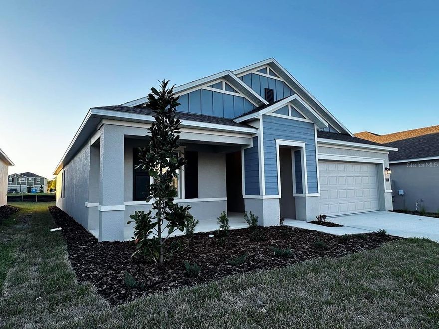 Located in Groveland, one of the fastest-growing areas in Lake County, this brand-new property offers an excellent combination of tranquility, nature, and easy access to major highways connecting to Clermont, Winter Garden, and the Orlando area. The home is situated in the Hidden Ridge at Estates at Cherry Lake community, a modern and well-planned community with wide streets, green spaces, and proximity to lakes, parks, and recreational areas. The property features an open, bright, and functional layout that includes three bedrooms and a versatile den/office that can easily be converted into a fourth bedroom, study, or home office. As an added bonus, the property includes a completely separate studio apartment with a private entrance, offering two living spaces within the same property. The apartment includes a living room, kitchen area, laundry room, bedroom, and private bathroom, providing greater flexibility for different living needs. The house is brand new and features upgrades designed greater comfort and an enhanced living experience.