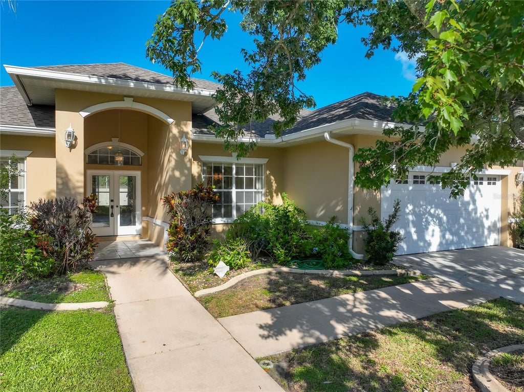 Photo of 3677 Whisperwood Circle, Melbourne, FL 32901 (MLS # O6444917)