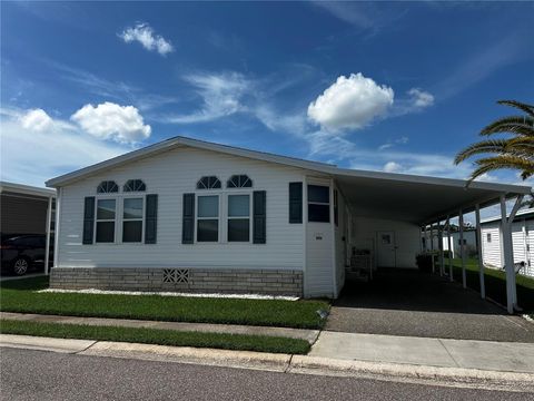 Photo of 1100 Belcher Road S #406, Largo, FL 33771 (MLS # TB8404614)