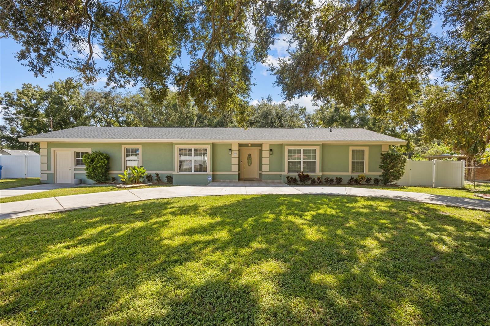 Spacious Multi-Generational Home with Income Potential – No HOA or CDD! Located in the heart of Tampa near the Selmon Expressway and US-301, this unique property offers the perfect blend of flexibility, space, and convenience. Situated on nearly half an acre, this rare gem features a 3-bedroom, 2-bathroom main home PLUS a 1-bedroom, 1-bathroom attached apartment with its own private entrance and central A/C – ideal for extended family, guests, or rental income. Enjoy the freedom to bring your RV, boat, trailer, or work truck with no HOA or CDD restrictions. Recent updates include a new roof (2024), remodeled bathroom (2025), vinyl plank flooring, AC (2014), and stainless steel appliances. Whether you're entertaining, relaxing, or investing, this versatile property is your chance to create your own private oasis in one of Tampa’s most accessible locations. Don’t miss out on this rare opportunity!