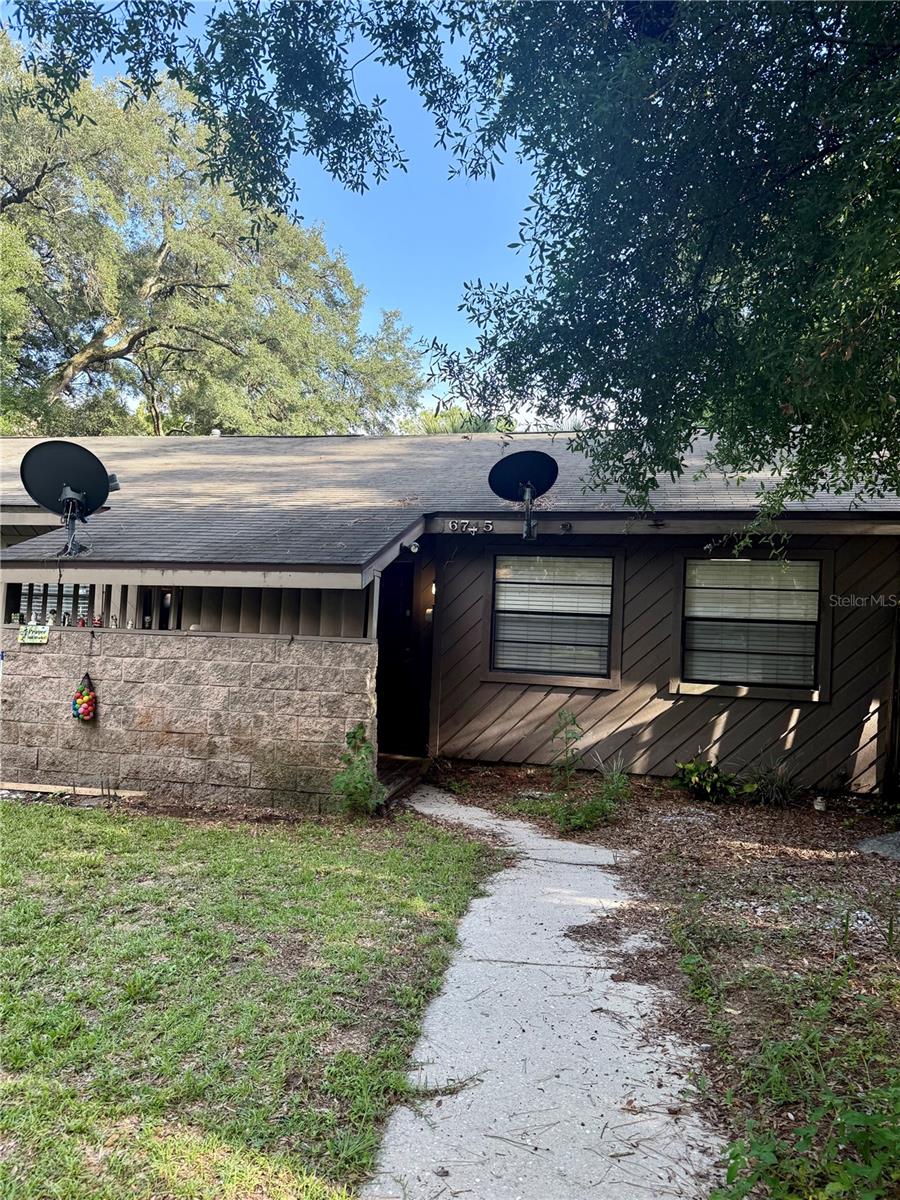 Available NOW and ready to move in! Don’t miss this beautifully maintained 2-bedroom, 1-bathroom home located in the desirable Green Leaf neighborhood, just off Tower Road in SW Gainesville. This property offers a bright and spacious layout with high ceilings, tiled floors in the hallway and bathroom, and brand new carpet in the living area and bedrooms.
As you arrive, you'll appreciate the large driveway with plenty of parking, a covered front porch, and a quiet, walkable location near Veterans Memorial Park. Step inside to a welcoming living space with great natural light. A hallway leads to the bathroom and both bedrooms, while the dining area flows into a galley-style kitchen equipped with a new gas stove, refrigerator, dishwasher, and plenty of cabinetry—perfect for easy, enjoyable cooking.
The primary bedroom is situated at the back of the home and features a built-in closet and sliding doors that open to a screened back porch, which overlooks the fully fenced backyard—ideal for relaxing or entertaining. The secondary bedroom also includes a built-in closet and a window with views of the lush yard. The hall bathroom offers a single vanity and a tub-shower combo.
A spacious laundry room off the back porch provides extra room for storage, hanging clothes, or even keeping a bike or gardening tools.
This home is just minutes from Publix, shopping, dining, schools, Haile Village, Celebration Pointe, and Butler Plaza, with easy access to UF, Shands, the VA, Santa Fe College, and the RTS bus line.
Move-in ready and packed with charm and functionality, this home offers comfortable living in one of Gainesville’s most convenient locations. Schedule your showing today!