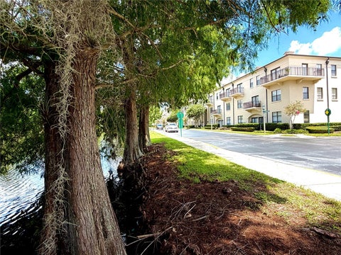 Photo of 909 Waterside Lane #205, Celebration, FL 34747 (MLS # S5153048)