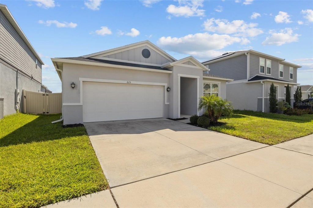 Photo of 625 Overpool Avenue, Davenport, FL 33896 (MLS # S5157290)