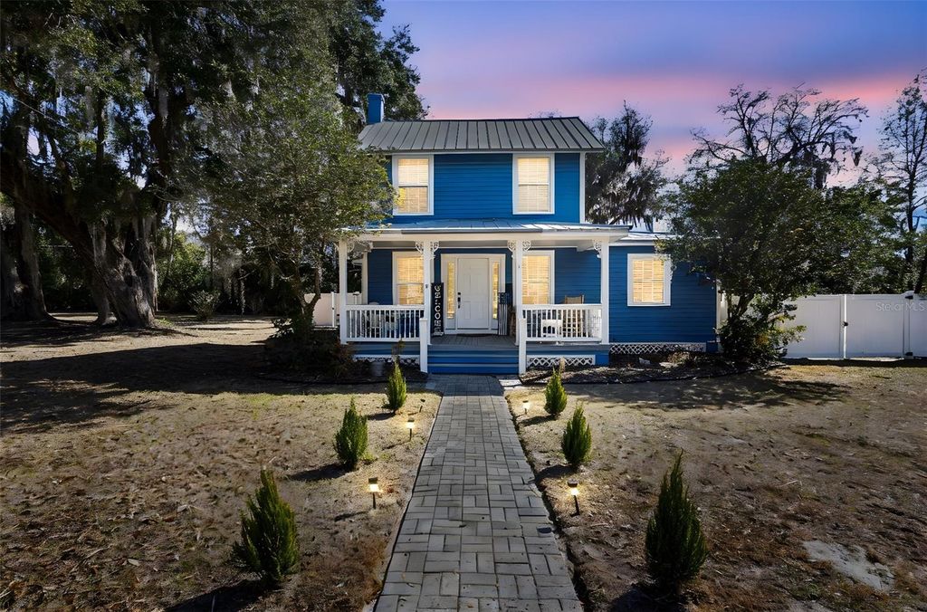 Photo of 310 S Holly Avenue, Orange City, FL 32763 (MLS # V4947387)