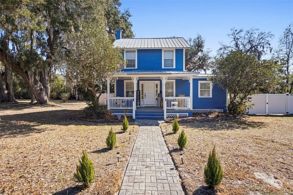 Photo of 310 S Holly Avenue, Orange City, FL 32763 (MLS # V4947387)