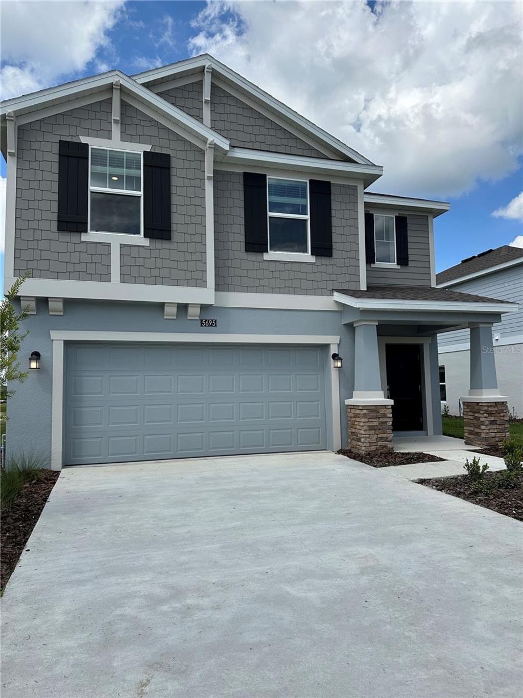 Photo of 5695 Ficus Aurea St, Kissimmee, FL 34758 (MLS # O6362740)