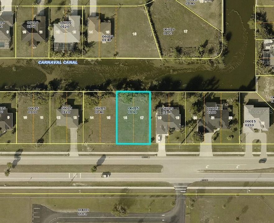This exceptional vacant lot in Cape Coral offers a rare opportunity to build your dream waterfront home. With generous dimensions of 80 by 125 feet, this spacious parcel provides ample room to design a stunning residence complete with a private pool and outdoor living spaces.  Situated on a tranquil waterfront setting, the lot promises serene views and enjoying the natural beauty of the area. The location combines privacy with convenience, placing you close to local amenities, golf courses, Marina’s, restaurants and WORLD CLASS BOATING that Cape Coral is known for.  Priced competitively to sell quickly, this property is ideal for buyers looking to create a custom home.