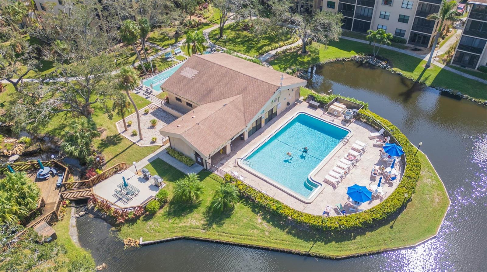 Renters! Experience the heart of the Florida lifestyle in this beautifully updated 2 bed, 2 bath corner unit rental filled with natural light and vacation vibes. After sun-filled days at nearby Coquina Beach, Holmes Beach, or Lido Key, unwind on your private balcony overlooking a peaceful pond and estuary, cocktail or book in hand. Just minutes from the vibrant nightlife, shopping, and dining scenes of downtown Sarasota and Bradenton, adventure is always within reach. With quick access to must-see attractions like the Ringling Museum, Robinson Preserve, and the Florida Railroad Museum, this is the perfect getaway — schedule your tour today before this gem is gone!