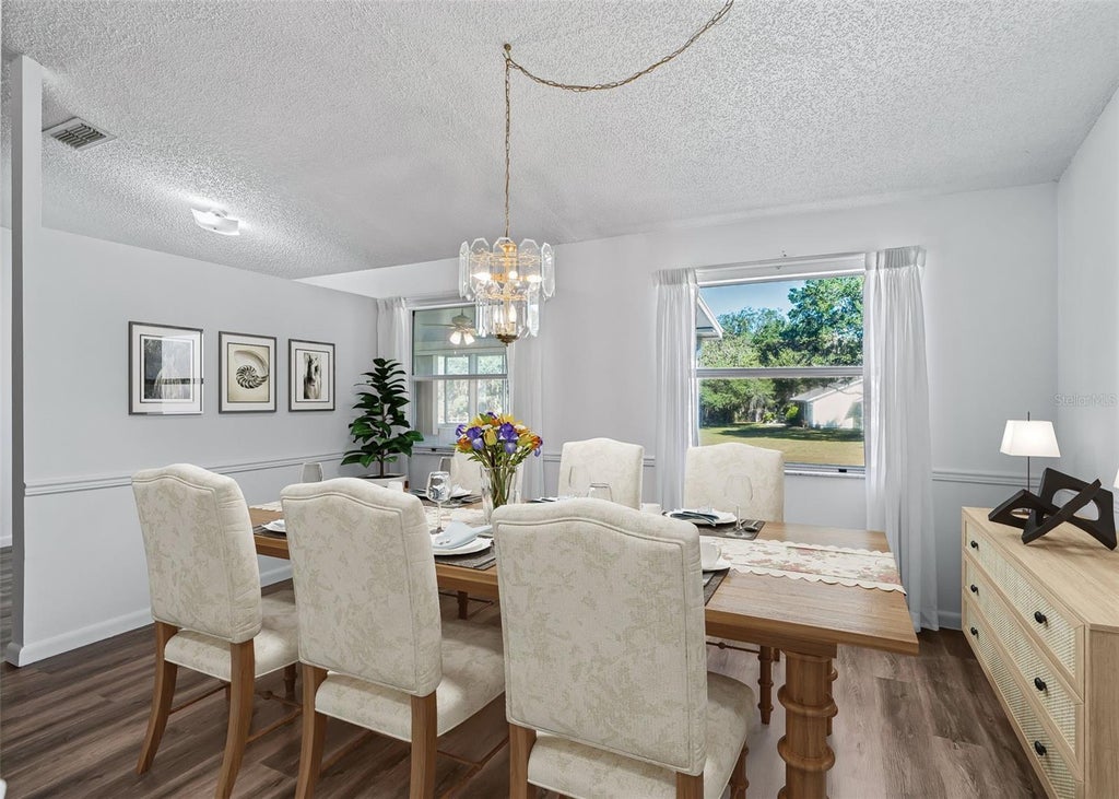 Photo of 1409 New Abbey Avenue, Leesburg, FL 34788 (MLS # G5118503)