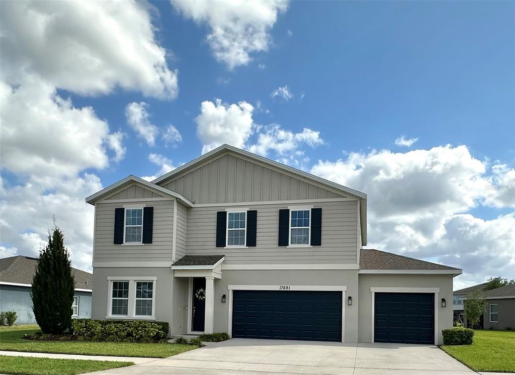 Photo of 17691 Passionflower Circle, Clermont, FL 34714 (MLS # O6368093)