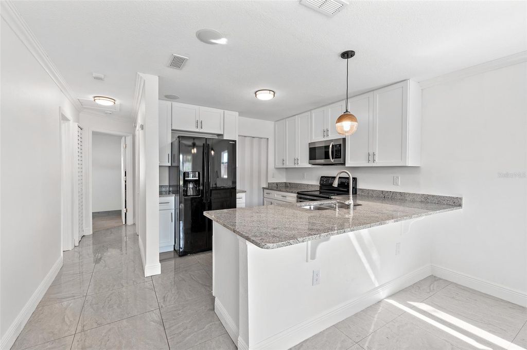 Photo of 218 Prince Avenue, Melbourne, FL 32901 (MLS # O6385570)