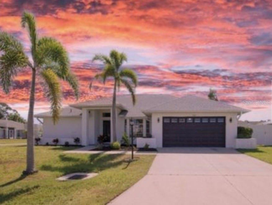 This custom residence represents the best of Florida living in Gulf View Estates, offering an exceptional opportunity. Recently transformed from top to bottom, this stunning property seamlessly blends contemporary design with practical luxury. Spanning over 2,100 square feet, the home boasts an inviting open-concept floor plan with cathedral ceilings that create an immediate sense of spaciousness and light. The split-bedroom layout ensures privacy and comfort. The home has been completely remodeled, including a new roof (2023), Updated AC system (2019), Electrical and Plumbing upgrades, and hard-to-find large heated pool with a spill over spa. The Kitchen is well equipped, featuring full quartz countertops, A large Island with a sink, Stainless Steel appliances, a double oven, and lots of storage. The master suite features a massive closet, dual vanities, a garden tub, and a walk in shower. There is also direct access to the pool via a french door. The house features premium vinyl flooring throughout, and modern lighting and fixtures. The lanai is expansive and features a pass through window to the dining area for entertaining, and an outdoor shower. Gulf View Estates is a well established HOA, with no CDD and a minimal HOA fee. Very convenient access to Manasota Beach, and also well located to take advantages of the many other amenities that we enjoy in the Venice area. No Flood Zone, and there is an assumable VA Loan with a 5.75 fixed rate. Make your appointment today!
