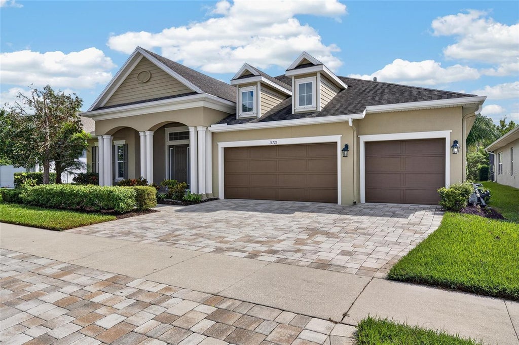 Photo of 16726 Courtyard Loop, Land O Lakes, FL 34638 (MLS # TB8560170)