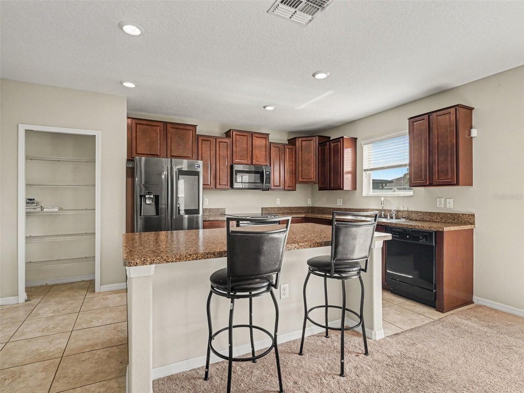 Photo of 2210 Purple Orchid Place, Ruskin, FL 33570 (MLS # TB8539867)