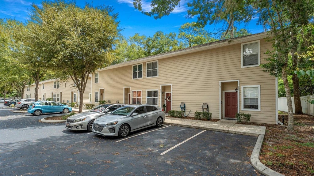 Photo of 1710 NW 7th Street #303, Gainesville, FL 32609 (MLS # OM729102)