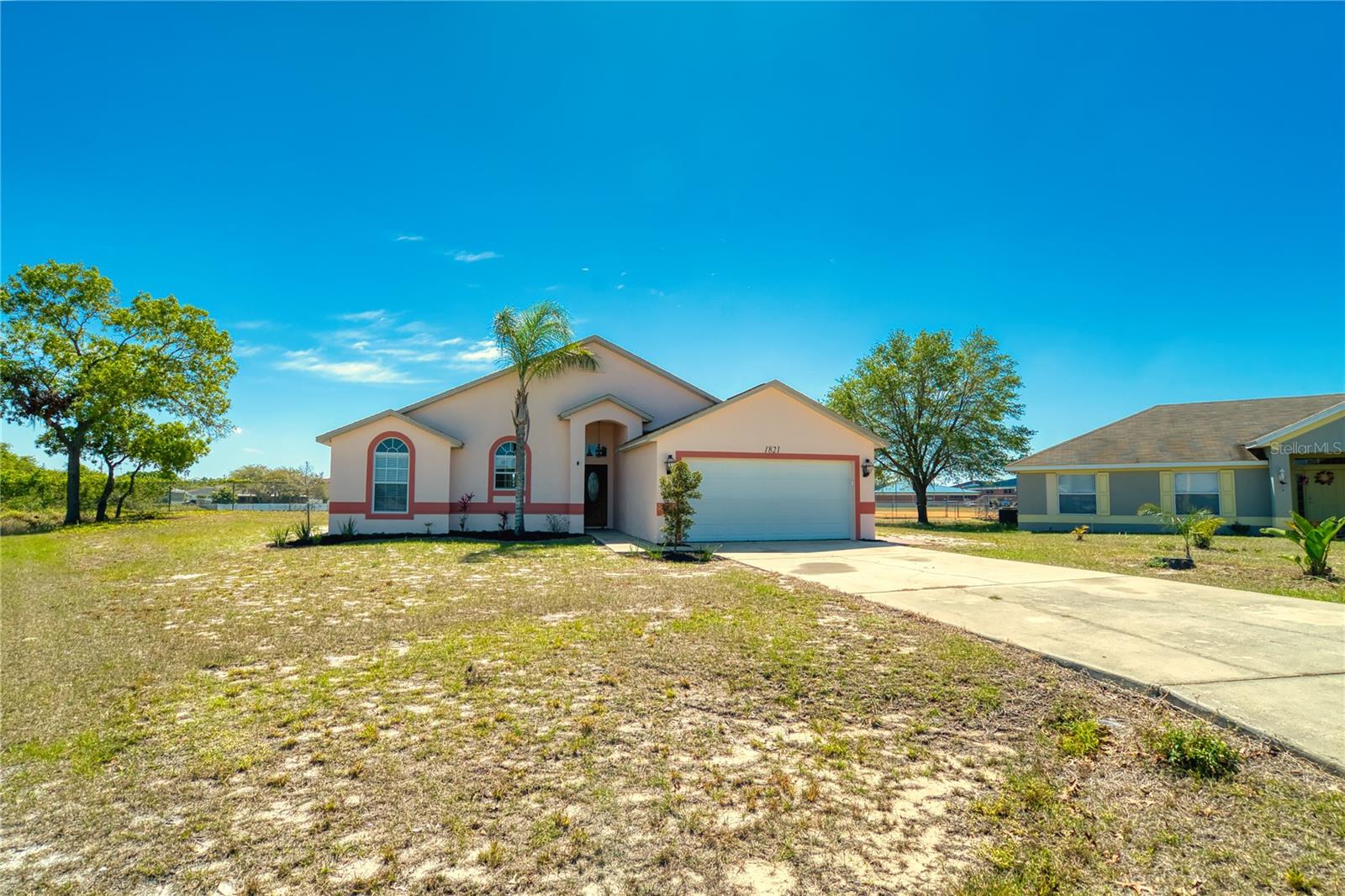 Located at the end of a quiet cul-de-sac, this 3-bedroom, 2-bathroom home offers privacy and convenience, backing directly up to the elementary school. The backyard features a covered patio with a relaxing breeze—perfect for enjoying Florida evenings. Rent includes basic cable and internet. Pet-friendly and ideal for families, the home also comes with a washer and dryer for added convenience.