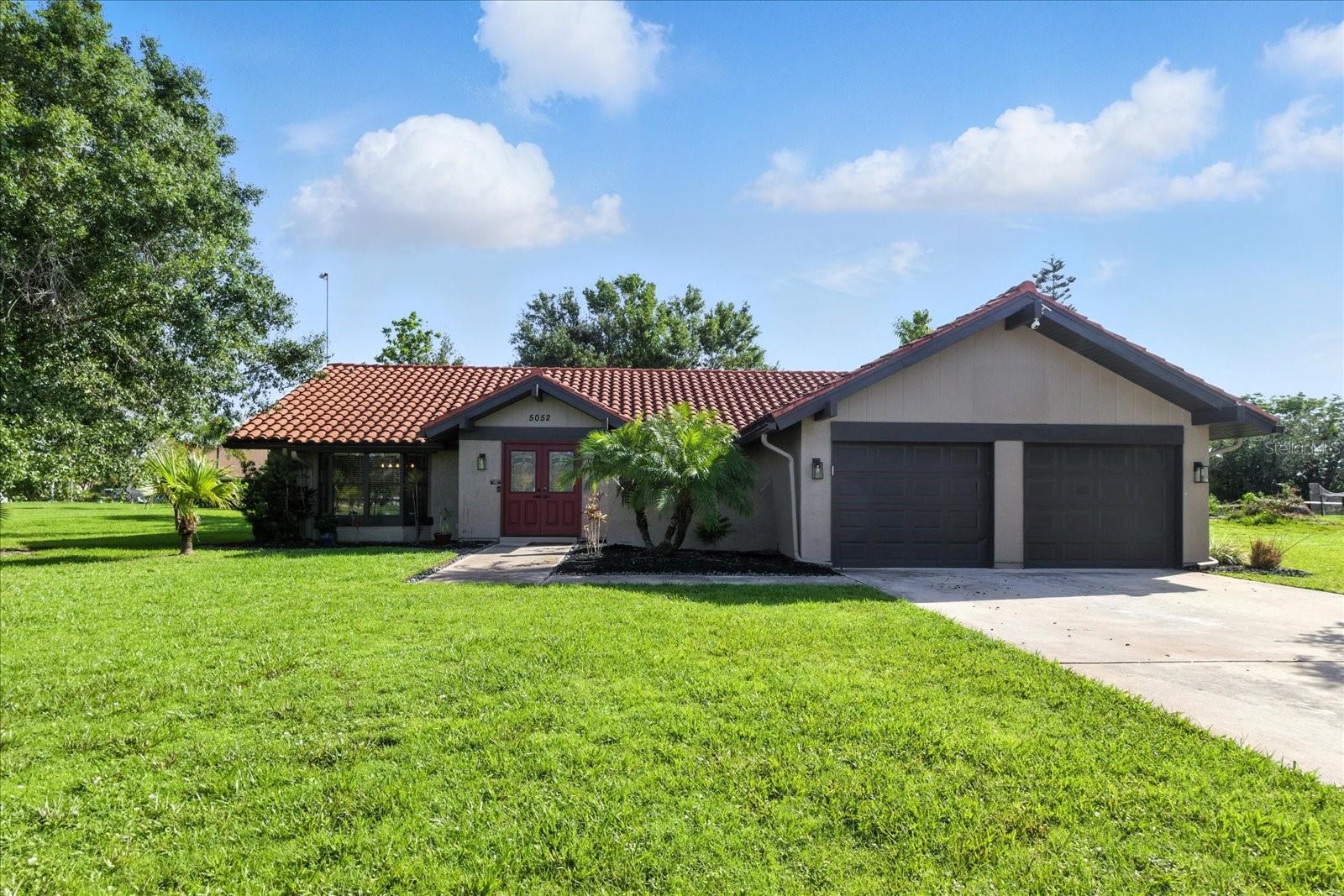 This beautifully maintained 3-bedroom, 2-bath home offers city water/sewer, a tile roof, and lush landscaping on a quiet North Port street. Step inside to NEW luxury vinyl plank flooring, modern lighting, updated doors, baseboards, and custom window treatments. The large Great Room boasts vaulted ceilings, floating shelves, and a pet door.
The gourmet kitchen features granite counters, soft-close cabinets, a pantry, a coffee bar, and a charming greenhouse window above the sink. Stainless steel appliances included! Dine in the cozy breakfast nook or formal dining area with triple windows.
The spacious master suite includes barn doors, a walk-in closet, and an en-suite bath with three vanities and a dual-head shower. The second bedroom has access to the guest bathroom, and the third bedroom has sliders out to a private patio to the front of the house. The fully fenced backyard is an entertainer’s dream—bar area, misting fan, storage hooks, privacy screen.
Located near Coco Plum Plaza, Braves Stadium, Wellen Park, Warm Mineral Springs, and North Port’s Aquatic Center—close to it all, yet tucked away. Don’t miss this gem, it's priced to sell and won't last long!