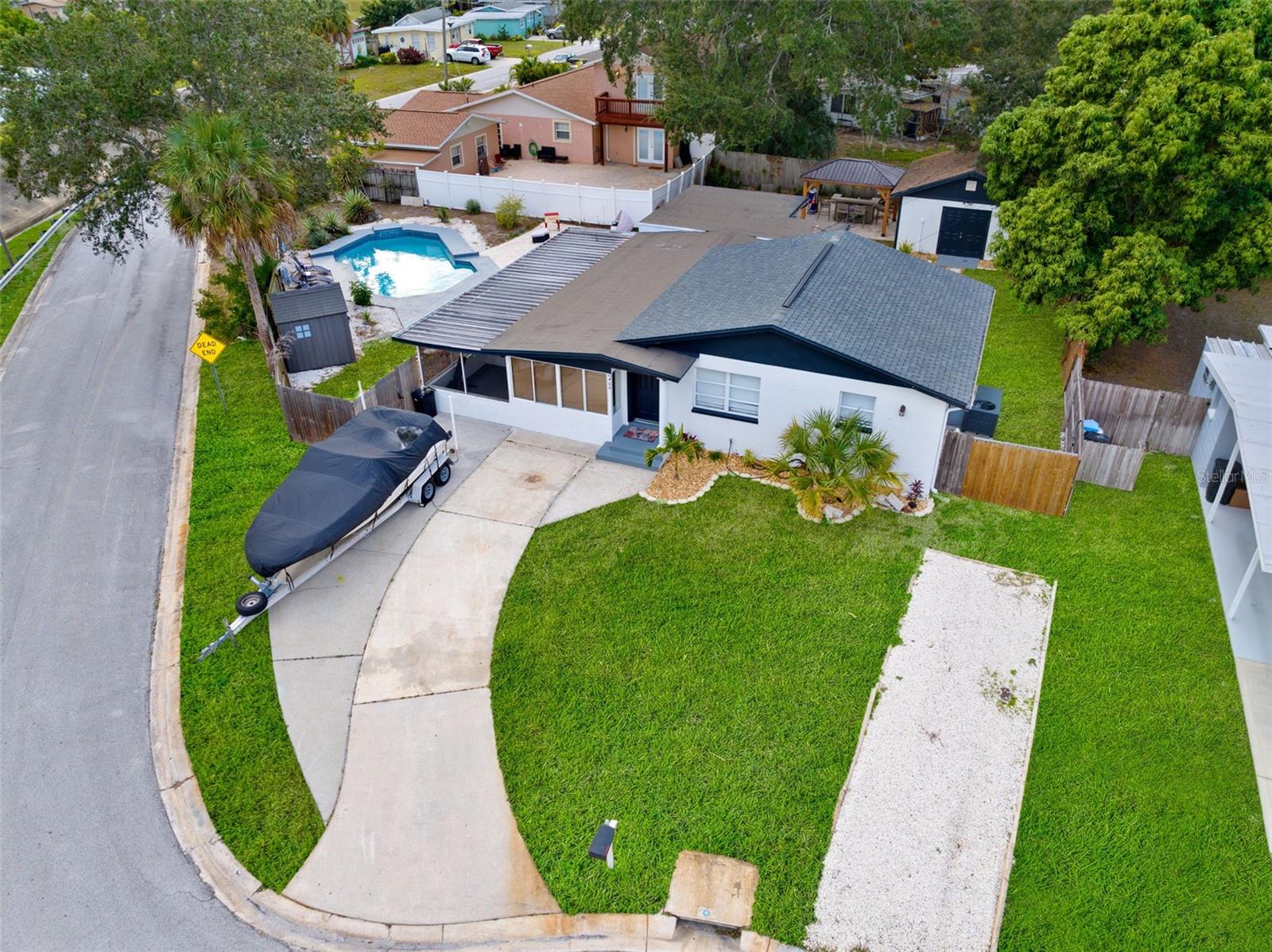 Coastal Paradise with Private Pool – No HOA – Prime Short-Term Rental Location. Just minutes from Madeira Beach, Indian Rocks, and Clearwater – ranked among the best beaches in the U.S., this stunning 3-bedroom, 2-bath home is the ultimate Florida investment property or dream getaway. From the moment you arrive, you’ll be captivated by the spacious layout, private pool, and the Tiki-style gazebo bar, perfect for endless entertaining. The beautifully landscaped yard features elegant, low-maintenance flooring, outdoor lounge areas, and parking space for up to 8 vehicles – ideal for hosting guests. Inside, the open-concept design flows effortlessly between the living room, dining area, and updated kitchen. A versatile bonus suite with private entrance can be used as a home office, guest quarters, or even a separate income-producing unit. The home also offers a dedicated game/entertainment area for family fun. With no HOA restrictions, you have complete freedom to operate as a profitable Airbnb or keep it as your own personal coastal retreat. Located near top-rated restaurants, boutique shops, St. Pete’s vibrant downtown, and world-famous sunsets, this property offers unmatched lifestyle and income potential. Schedule your private tour today and step into the Florida lifestyle you’ve been dreaming of.