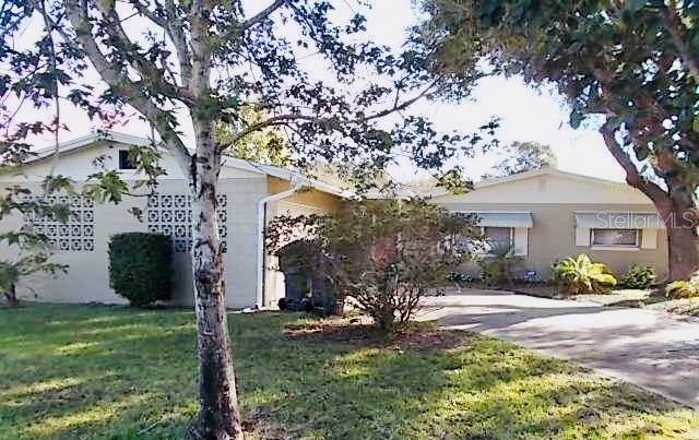 Short Sale. Approved Short Sale Price! Property is in good conditions but needs some TLC. Featuring 3 bedrooms and 2 baths in approximately 1,456 sq ft, this home has seen updates to flooring, kitchen, baths, and more. A bright open living/dining area flows into an oversized family room, while outdoor space includes a screened porch, storage shed, and plenty of yard for future enhancements. The 2-car garage, generous lot, and proximity to amenities make this an ideal opportunity for buyers and/or investors. Near major roads, highways, shopping plazas and much more.