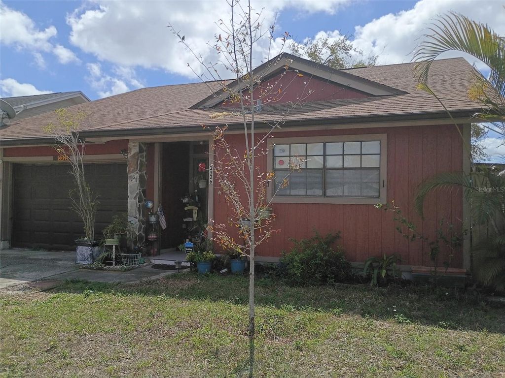 Photo of 3326 Whispering Drive N, Largo, FL 33771 (MLS # TB8460620)