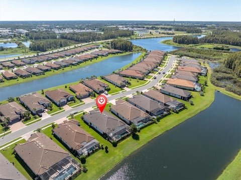 Photo of 11149 Egeria Drive, Odessa, FL 33556 (MLS # W7890257)