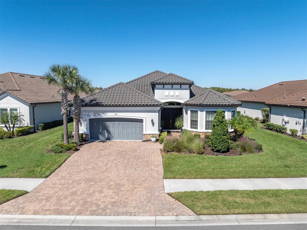 Photo of 11149 Egeria Drive, Odessa, FL 33556 (MLS # W7890257)