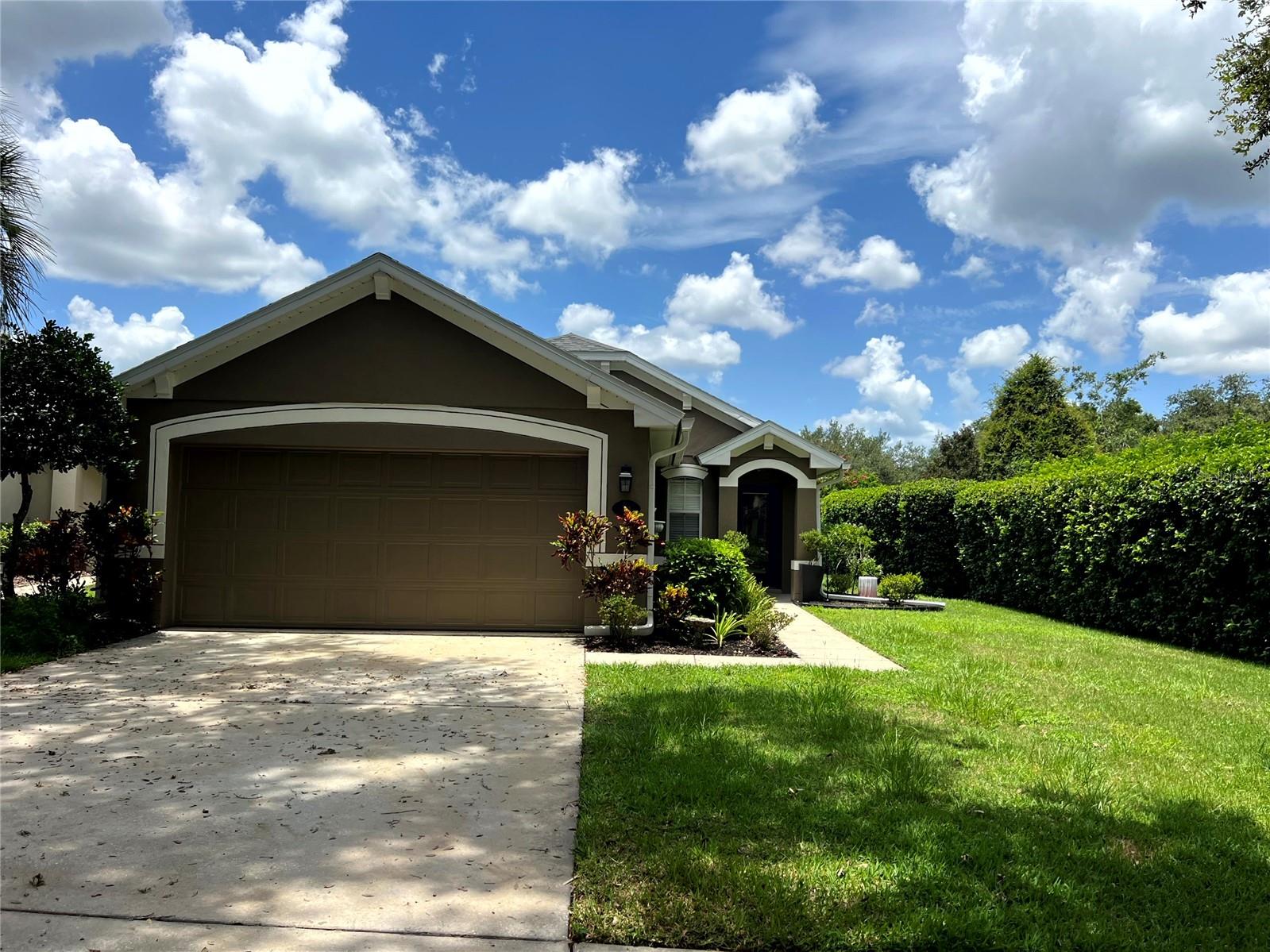 Don't miss this home in the highly sought after Victoria Park neighborhood. This beautifully maintained 4 bedroom, 2 bath home offers many impressive upgrades to include: a light and bright kitchen with quartz countertops, wood cabinets, and stainless steel appliances, split bedroom plan offering privacy, and a spacious primary bedroom with a large walk-in closet. Additionally, the home features an ensuite bathroom with dual sinks, a natural gas hot water heater, a natural gas fireplace, laminate floors, water softener, and a covered, screened lanai for those peaceful evenings. Come join in the Victoria Park lifestyle. Victoria Park is a very active community offering a variety of amenities to include resort style pools, fitness centers, lighted tennis and pickleball courts, and so much more. Victoria Hills is conveniently located with easy access to I-4, shopping, hospitals, our beautiful beaches, and our fun-filled attractions. Don't miss this opportunity to schedule your private showing. Call today for your tour of this beautiful home.