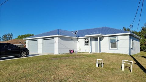 2209/2211 DANIEL AVENUE N LEHIGH ACRES FL 33971