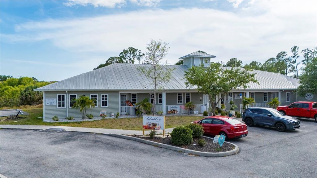 Photo of 2525 Bobcat Village Center Road, North Port, FL 34288 (MLS # C7509161)