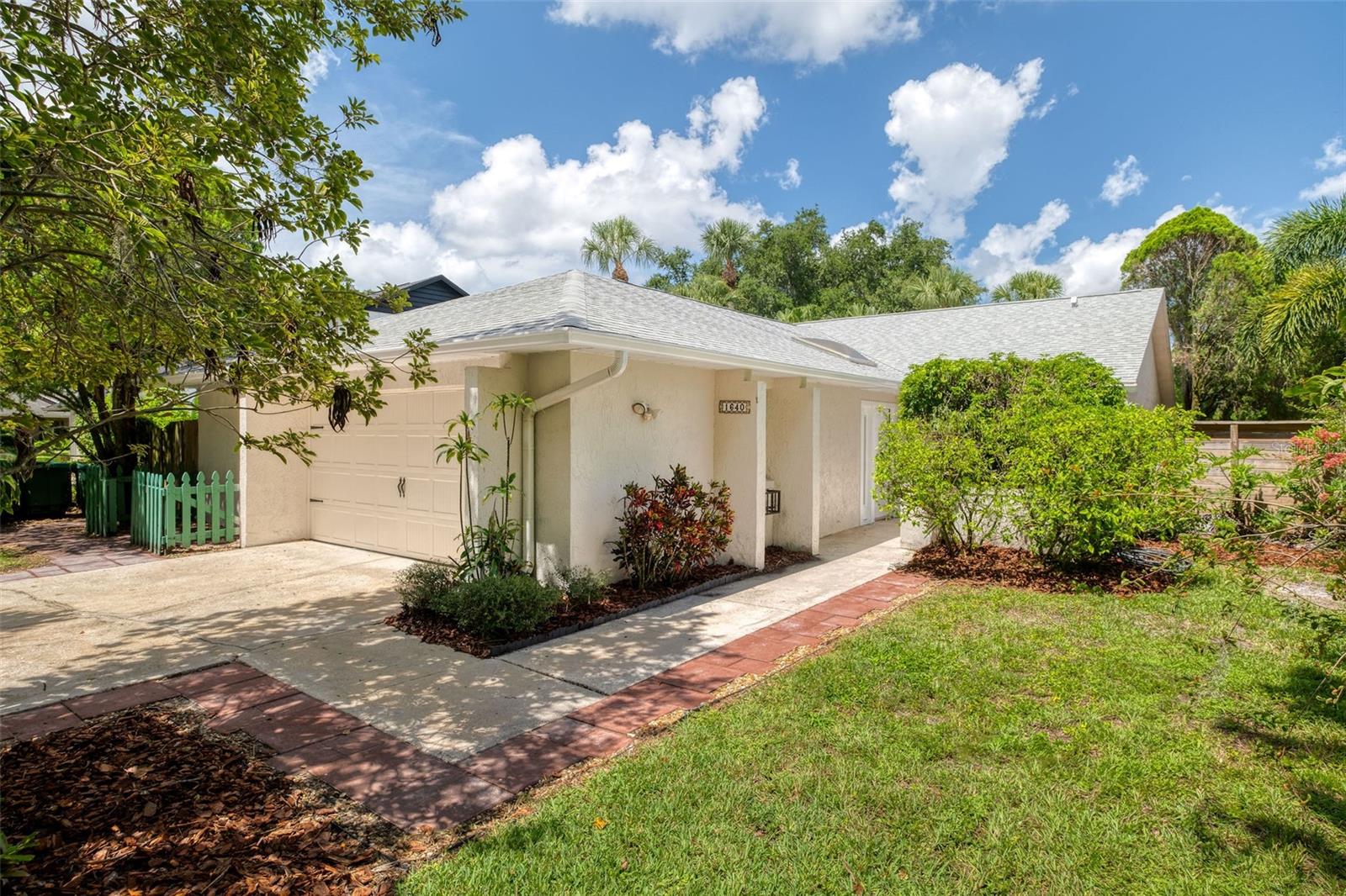 Welcome to 1640 Cypress Point – a home like no other in Winter Park. This beautifully maintained 3-bedroom, 2-bathroom home offers 1,704 sq. ft. overlooking a serene spring-fed pond and the Winter Park Pines Golf Course. Nestled on a quiet street with a cul-de-sac, this property combines privacy, natural beauty, and convenience in one exceptional location. As you walk up to the front door, you’ll notice an inviting and private courtyard area. Step inside to a light-filled entryway and an open layout accented by wood laminate flooring, fresh interior and exterior paint (2025), high ceilings, and a wood-burning fireplace with coquina rock detail and a wood mantel. The kitchen was remodeled in 2012, and features natural wood cabinetry, jade green granite countertops with a chiseled edge, stainless steel appliances, and a cozy dinette area, which looks out to the side yard through the sliding doors. Off of the living area you can access the third bedroom with french doors that lead out to the pool area. This space could also be used as a den or office space. Down the hall, the primary suite boasts a large walk-in closet, and Italian inspired ensuite bathroom with imported Italian tile in the walk-in shower, a marble vanity, and open shelving for plenty of storage. You can also access the side yard from the primary bedroom which leads out to a mulched patio area to enjoy your morning or sunset water views. The additional bedrooms share a hall bath with a granite vanity and tub/shower combo. Enjoy Florida living in your private backyard oasis! The sparkling pool, resurfaced with new coping in 2016, features three waterfalls and a decorative stone wall, all set against lush landscaping and sweeping views of the pond and 18 hole golf course.This home is located in a prime location just minutes from Cady Way Trail, Cady Way pool & courts, Winter Park Pines Golf Course, Center for Health and Wellbeing, Crosby Fitness Center, Ward Park, Showalter Field, YMCA, Advent Health Winter Park Hospital and less than 10 minutes to Historic Park Avenue fine dining and shopping. Close to Rollins College, UCF, Full Sail, and only 30 minutes to OIA airport. Zoned for top-rated Brookshire Elementary, Glenridge Middle, and Winter Park High.Don’t miss your chance to own this rare Winter Park gem—schedule your showing today! Roof 2017, HVAC 2017, Re-plumbed 2015, Water Heater 2009, Garage Door 2023