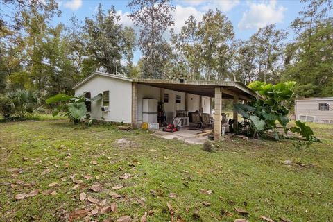 Photo of 1377 NE 143rd Avenue, Old Town, FL 32680 (MLS # GC534653)