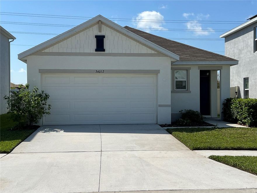 Welcome to your dream rental home in the sought-after Summerstone subdivision of Wesley Chapel! This beautifully maintained 3-bedroom, 2-bathroom home, just 2 years old, boasts modern features and a functional layout. Enjoy tile floors throughout, with carpeted bedrooms for added comfort. The kitchen is a chef’s delight with granite countertops, dark wood cabinets, stainless steel appliances, and a spacious open design. The primary suite features a walk-in closet and bathroom with double sinks and a semi-frameless walk-in shower. Additional conveniences include an inside laundry room with a washer and dryer. Relax or entertain on the screened back porch overlooking the fenced backyard. The community offers resort-style amenities, including a pool, open-air pavilion with a kitchen, playground, and basketball court. Perfectly located just 15 minutes from I-75, you’ll find shopping, medical facilities, an ice rink, and a variety of dining and entertainment options nearby. This home truly has it all! Application fee of $100 per adult - non refundable. Anyone 18 or above residing in the property must apply. Credit and background checks will be done. NET income (income after taxes and deductions) must be a minimum of 3x the rent - verification necessary. Lease must start within 2 weeks of acceptance. HOA requires a $200 security deposit for Common areas.