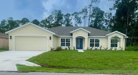 Photo of 94 Renshaw Drive, Palm Coast, FL 32164 (MLS # FC310175)