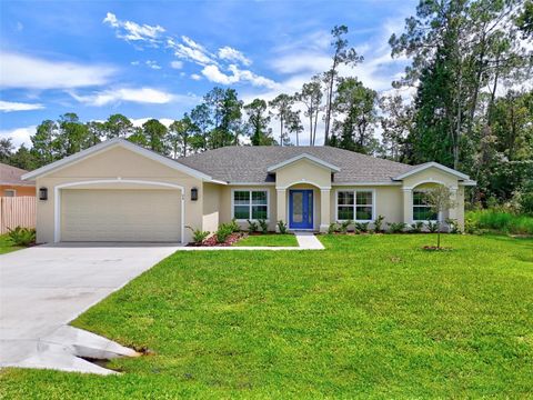 Photo of 94 Renshaw Drive, Palm Coast, FL 32164 (MLS # FC310175)