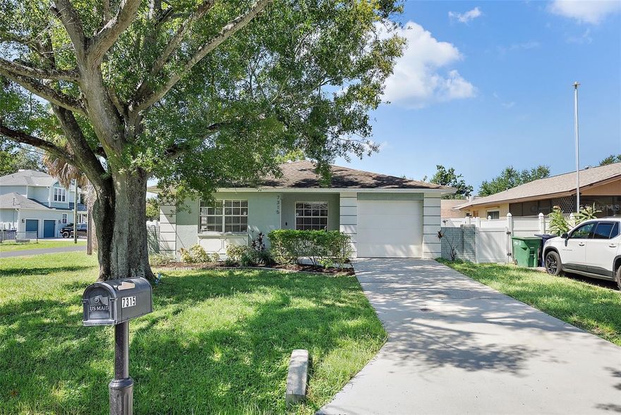 South Tampa Gem on a Corner Lot — Move-In Ready!  Discover this beautifully updated 3-bedroom, 2-bath South Tampa home, perfectly positioned on a spacious corner lot in a desirable south Tampa location. This home is completely turn-key and ready for you to move right in.  Step inside to find an open, light-filled layout featuring new luxury vinyl plank flooring throughout most of the home. The modern kitchen showcases quartz countertops, stainless steel appliances, and custom cabinetry, creating the perfect space for cooking while entertaining your guests.  The large primary suite includes a gorgeous updated ensuite bath, while both bathrooms feature brand-new vanities and stylish tile finishes. Each bedroom comes equipped with custom closet organizers, adding both function and sophistication.  Enjoy Florida living in the spacious, fully fenced backyard—complete with a vinyl privacy fence and a large roll gate, ideal for boat or camper storage. The oversized attached garage offers plenty of room for parking and extra storage.  Additional updates include a newer hot water heater, ensuring peace of mind for years to come.  Located just minutes from MacDill Air Force Base, parks, restaurants, and shopping, this home offers unbeatable convenience and a true South Tampa lifestyle.