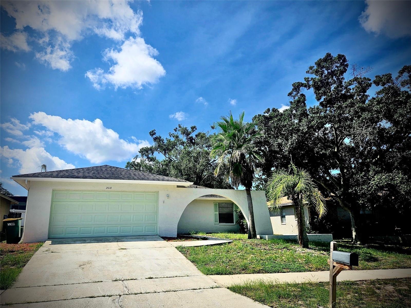 This beautiful 3/2/2 home is located in the Palm Harbor University High School zone and in close proximity to Crystal Beach, entertainment and shopping. New flooring and paint! Kitchen features Granite Countertops and Stainless Steel Appliances. Open and split floorplan. Master bedroom features master bath and two closets. Large screened in lanai and fenced in backyard. Application fees are $49.99 per adult. $350 pet fee, no aggressive breeds.