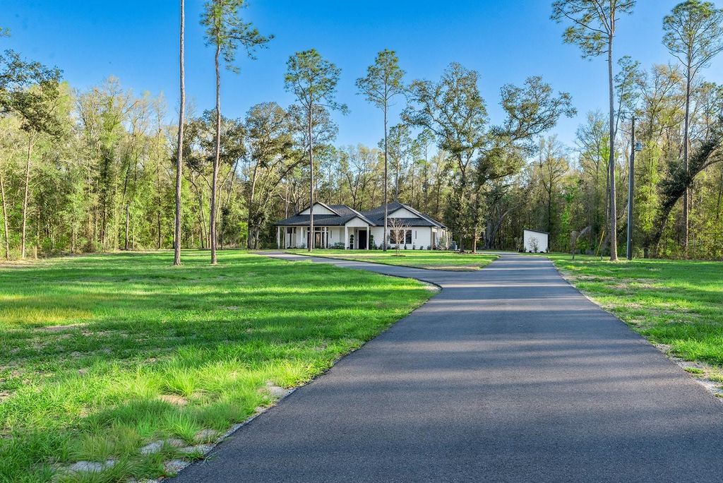 Photo of 3821 NE County Road 138, High Springs, FL 32643 (MLS # GC538738)